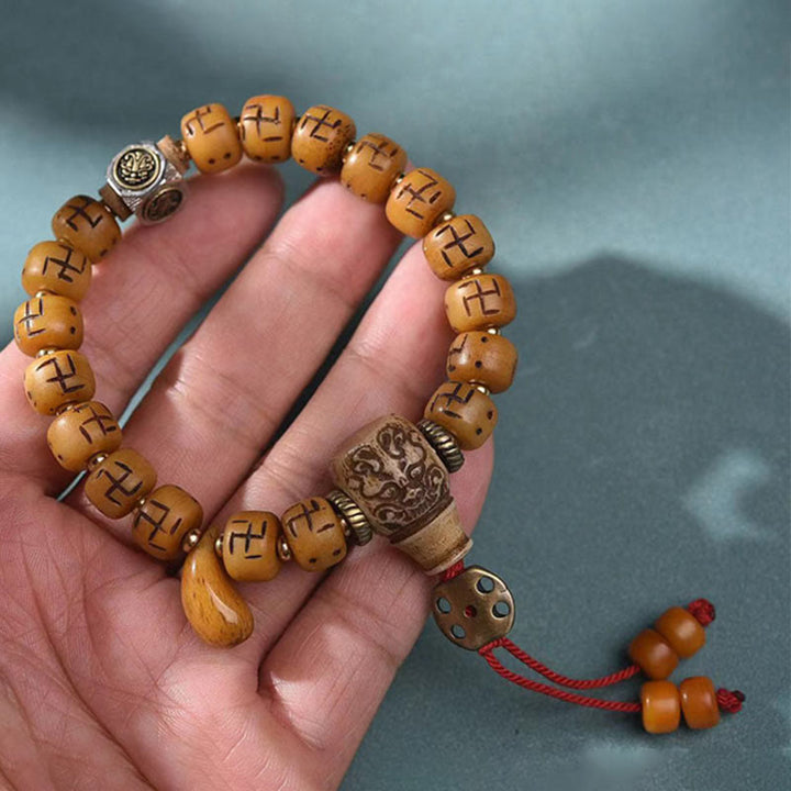 BWOOOH Natural Tibetan Camel Bone Swastika Dzi Bead Shankha Buddha Charm Kirtimukha Luck Protection Tassel Bracelet