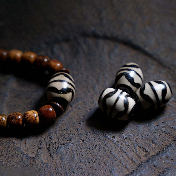 BWOOOH Tibetan Bodhi Seed Amber Dzi Bead Agate Zakiram Goddess of Wealth Beads Triple Wrap Bracelet