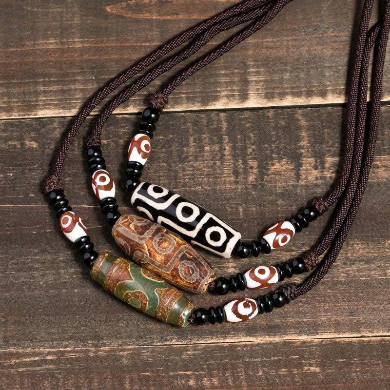 BWOOOH Tibetan Nine-Eye Dzi Bead protection string necklace — sacred dzi bead necklace and Buddhist amulet for wealth and wisdom
