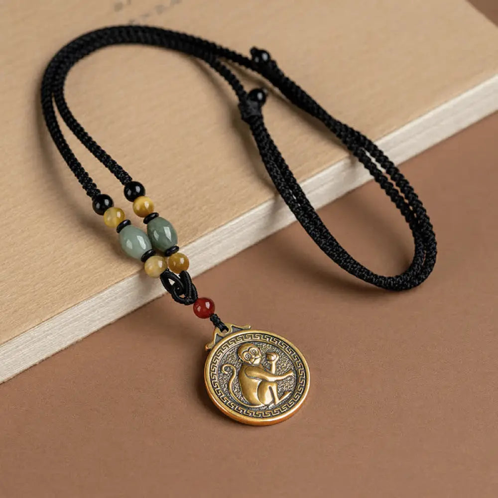 BWOOOH 12 Chinese Zodiac Blessing Wealth Fortune Necklace Pendant featuring a 3cm copper/brass pendant with Tiger Eye, Red Agate, Jade, and Agate, suspended on a 45-68cm string, showcasing a specific zodiac animal for spiritual balance and protection. - View 21