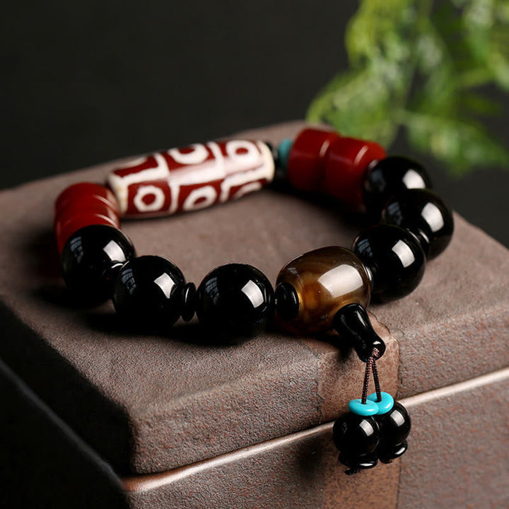 BWOOOH Tibetan Nine-Eye Dzi Bead Black Onyx Wealth Protection Bracelet