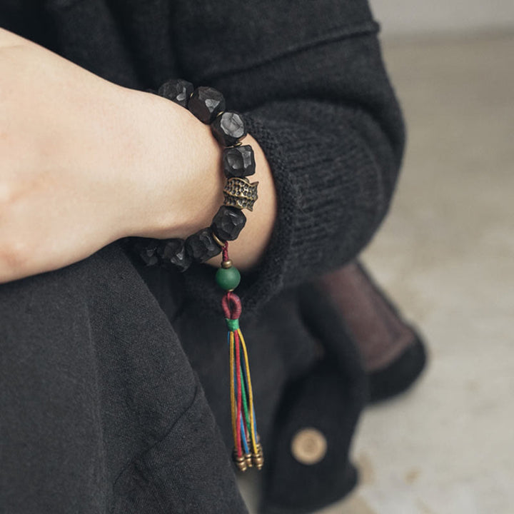 BWOOOH Tibet Ebony Wood Copper Peace Tassel Wrist Mala Bracelet