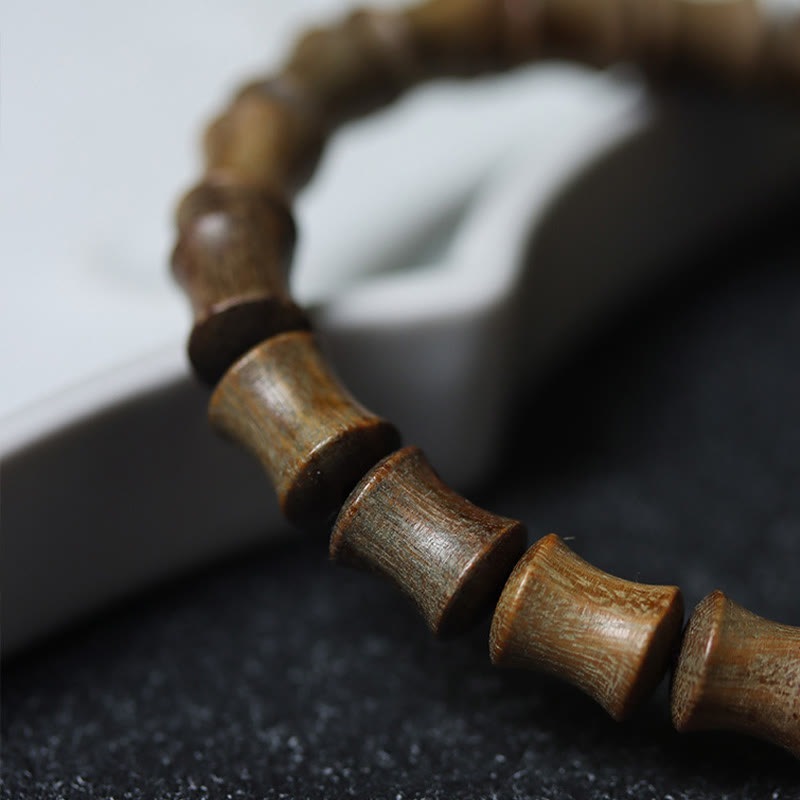 BWOOOH Tibetan Nine-Eye Dzi Bead Green Sandalwood Peace Bracelet