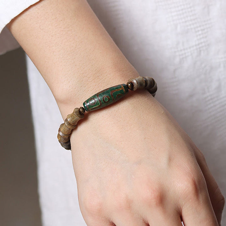 BWOOOH Tibetan Nine-Eye Dzi Bead Green Sandalwood Peace Bracelet