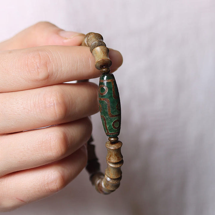 BWOOOH Tibetan Nine-Eye Dzi Bead Green Sandalwood Peace Bracelet