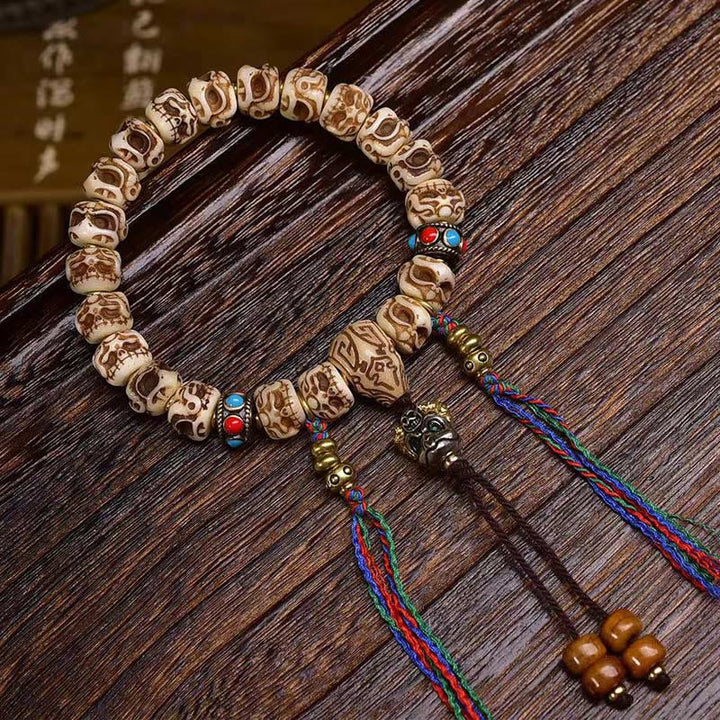 BWOOOH Tibetan Camel Bone Garuda Carved Protection Tassel Bracelet