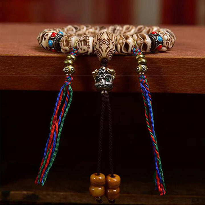 BWOOOH Tibetan Camel Bone Garuda Carved Protection Tassel Bracelet