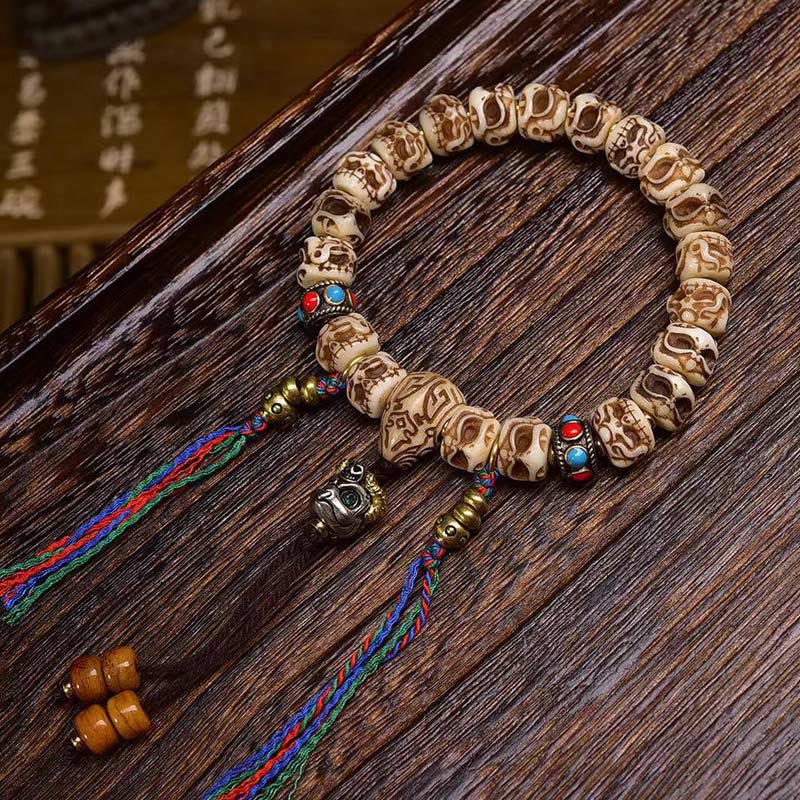 BWOOOH Tibetan Camel Bone Garuda Carved Protection Tassel Bracelet — natural stone Tibetan bracelet for spiritual healing ...