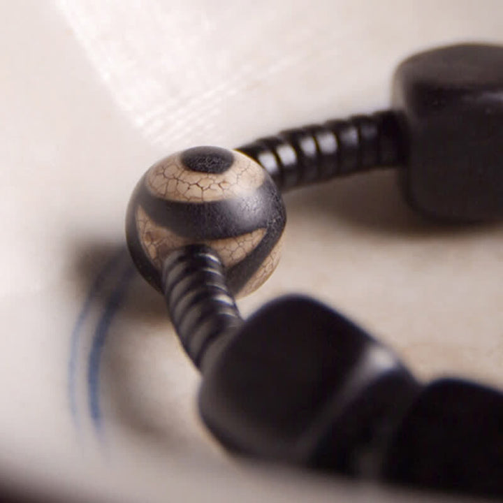 BWOOOH Tibetan Ebony Wood Dzi Bead Strength Bracelet  -  Ebony Tibetan bracelet for spiritual healing and mindful living
