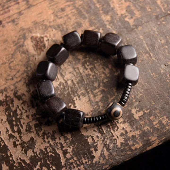BWOOOH Tibetan Ebony Wood Dzi Bead Strength Bracelet  -  Ebony Tibetan bracelet for spiritual healing and mindful living