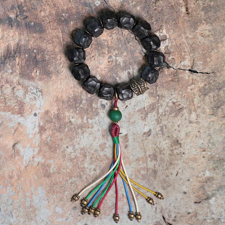 BWOOOH Tibet Ebony Wood Copper Peace Tassel Wrist Mala Bracelet
