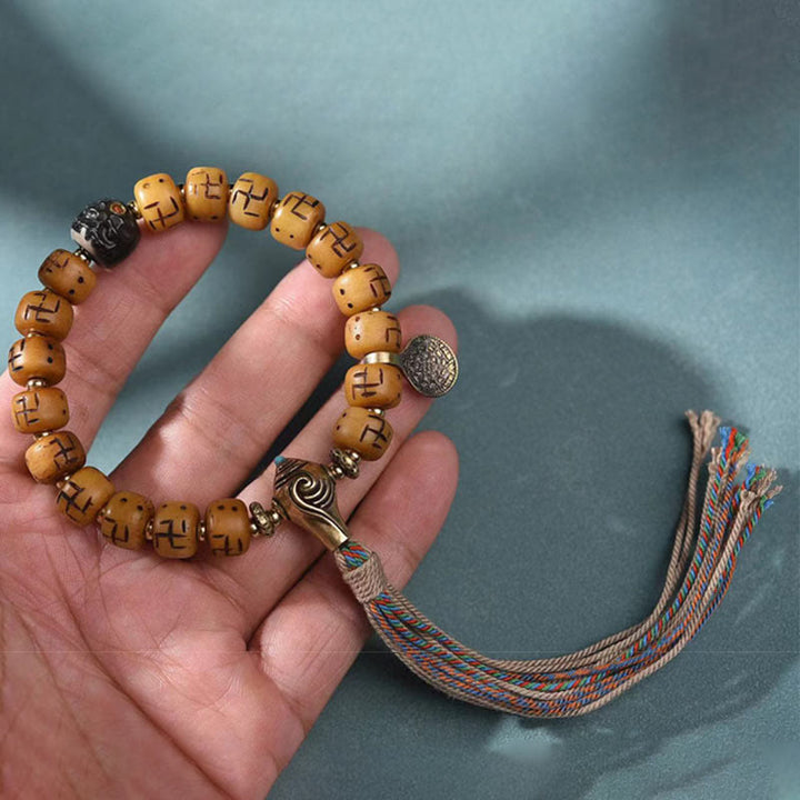 BWOOOH Natural Tibetan Camel Bone Swastika Dzi Bead Shankha Buddha Charm Kirtimukha Luck Protection Tassel Bracelet