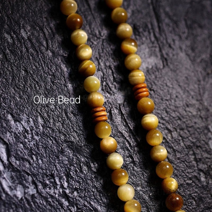 BWOOOH 108 Mala Beads Natural Tiger Eye Copper Dorje Protection Tassel Bracelet
