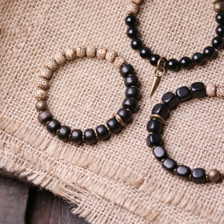 BWOOOH Tibetan Bodhi Seed Black Obsidian Ebony Wood Copper Peace Bracelet