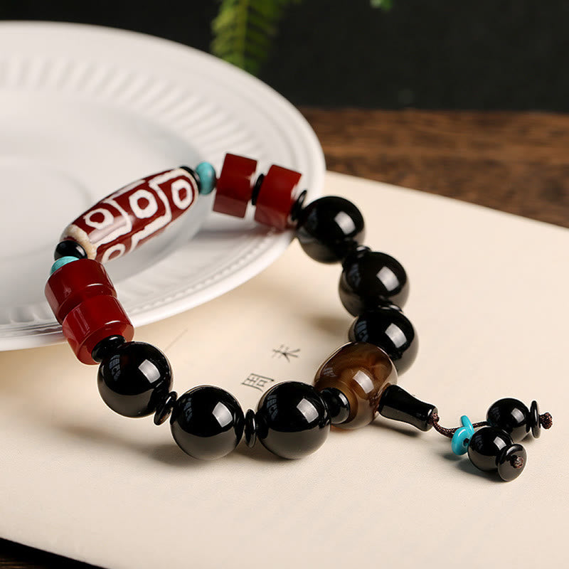 BWOOOH Tibetan Nine-Eye Dzi Bead Black Onyx Wealth Protection Bracelet