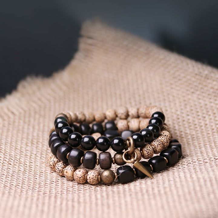 BWOOOH Tibetan Bodhi Seed Black Obsidian Ebony Wood Copper Peace Bracelet