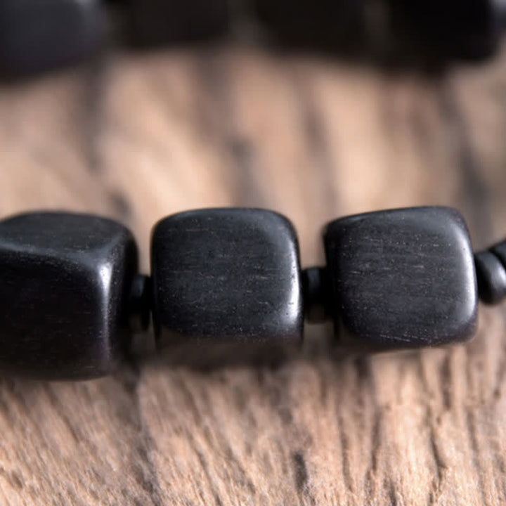 BWOOOH Tibetan Ebony Wood Dzi Bead Strength Bracelet  -  Ebony Tibetan bracelet for spiritual healing and mindful living