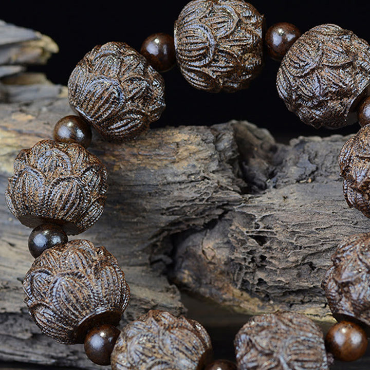 BWOOOH Ebony Wood Eighteen Arhats Lotus Dragon Engraved Balance Bracelet | spiritual healing bracelet