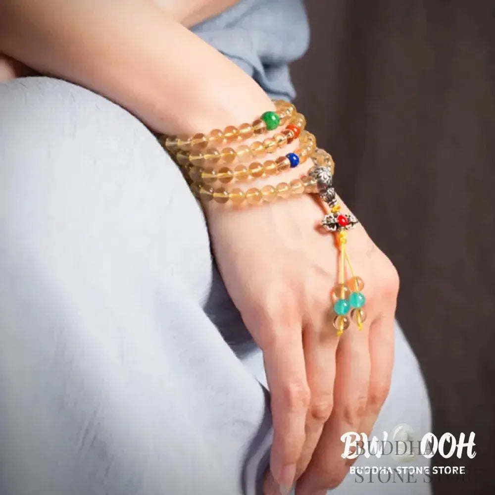 BWOOOH 925 Sterling Silver 108 Mala Beads bracelet, featuring polished 6mm and 8mm natural Citrine, Red Agate, and Amber, with sterling silver accents on a premium elastic string, designed for meditation and spiritual well-being. - View 4