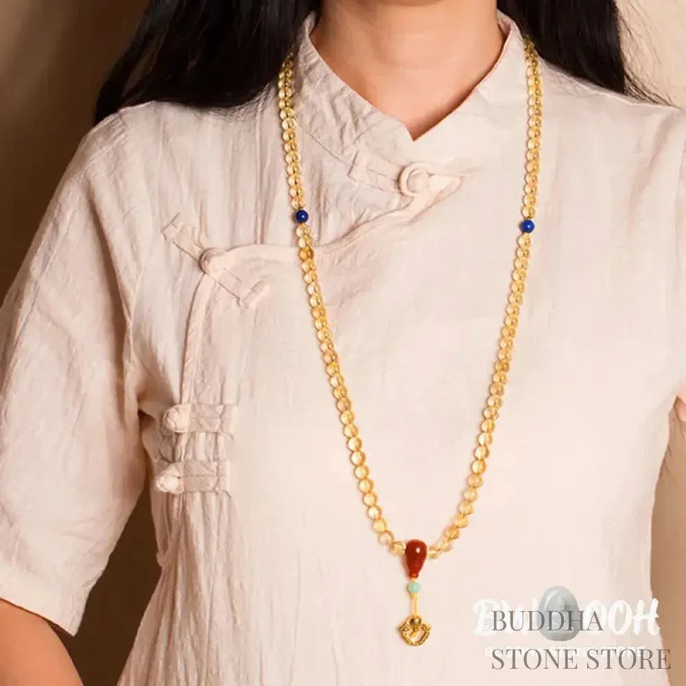 BWOOOH 925 Sterling Silver 108 Mala Beads bracelet, featuring polished 6mm and 8mm natural Citrine, Red Agate, and Amber, with sterling silver accents on a premium elastic string, designed for meditation and spiritual well-being. - View 3