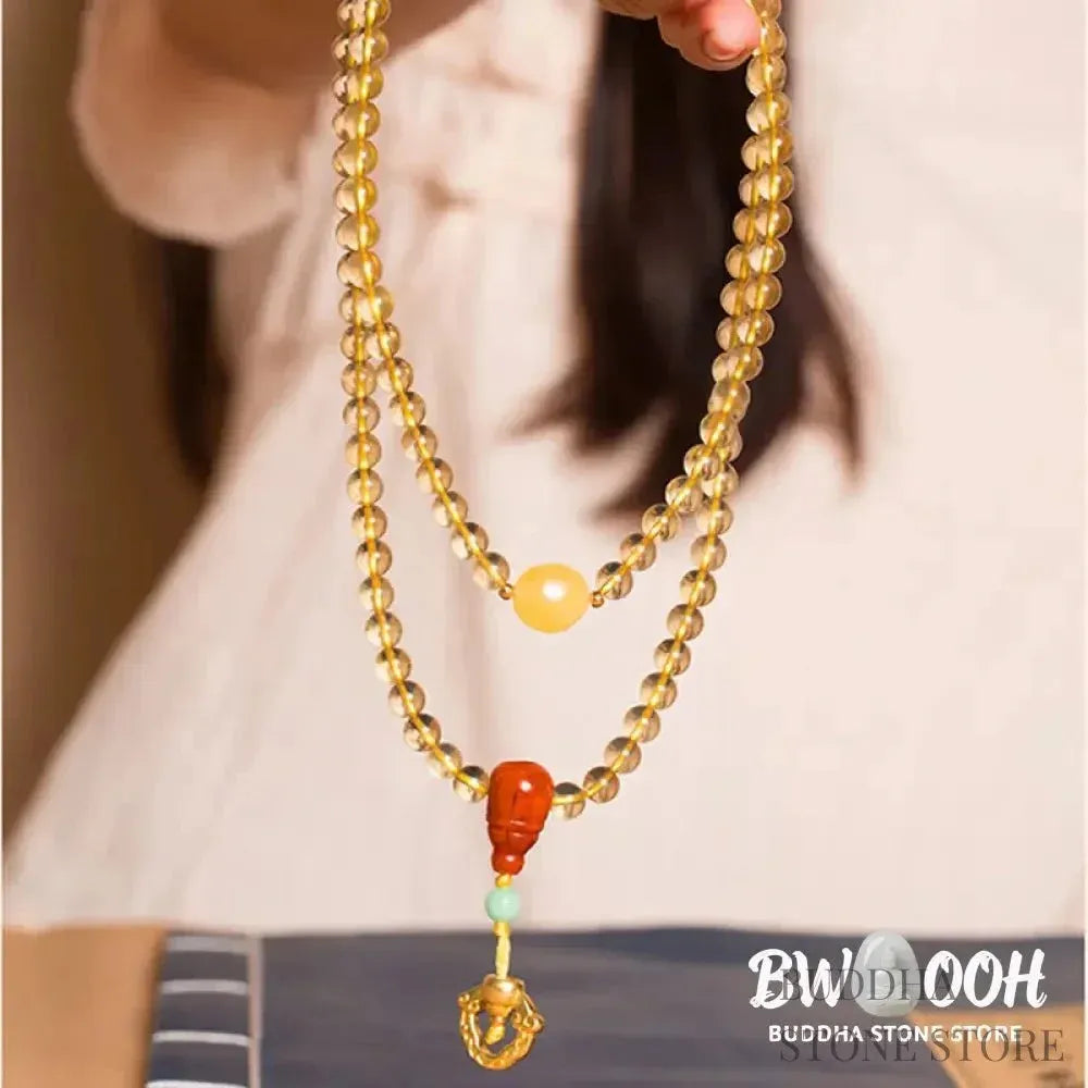 BWOOOH 925 Sterling Silver 108 Mala Beads bracelet, featuring polished 6mm and 8mm natural Citrine, Red Agate, and Amber, with sterling silver accents on a premium elastic string, designed for meditation and spiritual well-being. - View 2