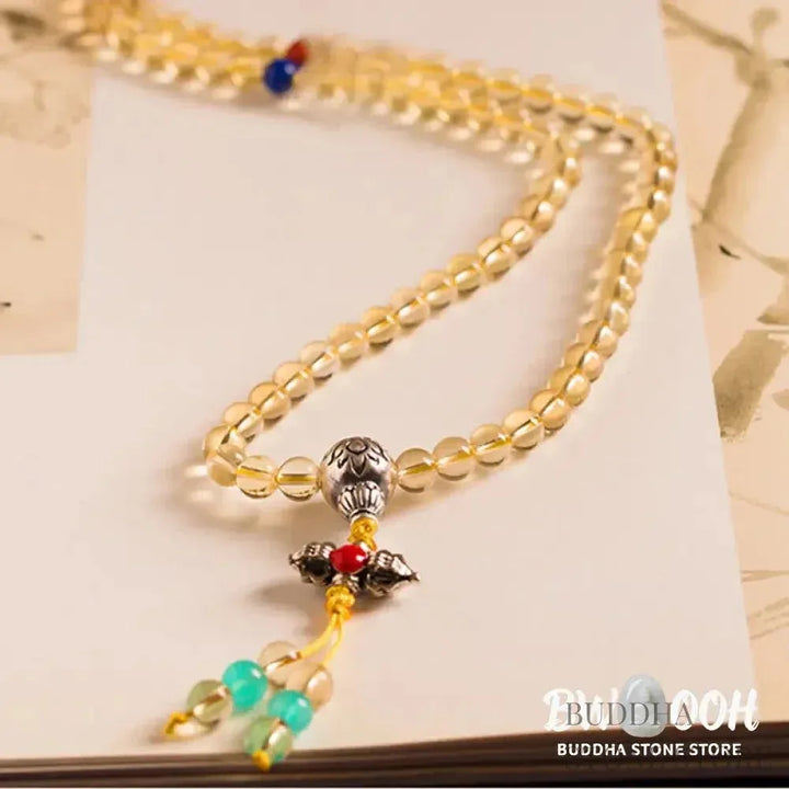 BWOOOH 925 Sterling Silver 108 Mala Beads bracelet, featuring polished 6mm and 8mm natural Citrine, Red Agate, and Amber, with sterling silver accents on a premium elastic string, designed for meditation and spiritual well-being. - View 22