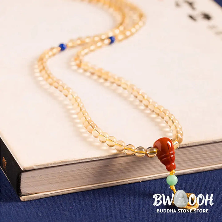 BWOOOH 925 Sterling Silver 108 Mala Beads bracelet, featuring polished 6mm and 8mm natural Citrine, Red Agate, and Amber, with sterling silver accents on a premium elastic string, designed for meditation and spiritual well-being. - View 11
