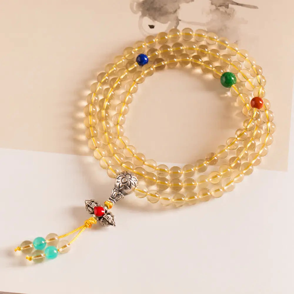 BWOOOH 925 Sterling Silver 108 Mala Beads bracelet, featuring polished 6mm and 8mm natural Citrine, Red Agate, and Amber, with sterling silver accents on a premium elastic string, designed for meditation and spiritual well-being. - View 16