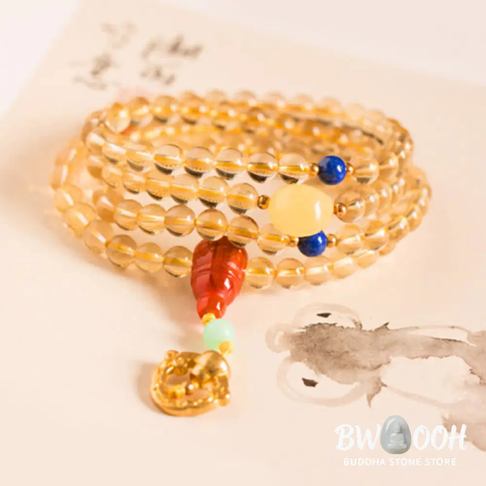 BWOOOH 925 Sterling Silver 108 Mala Beads bracelet, featuring polished 6mm and 8mm natural Citrine, Red Agate, and Amber, with sterling silver accents on a premium elastic string, designed for meditation and spiritual well-being. - View 7