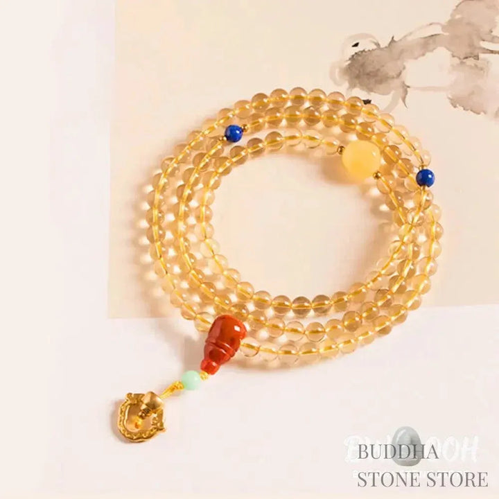 BWOOOH 925 Sterling Silver 108 Mala Beads bracelet, featuring polished 6mm and 8mm natural Citrine, Red Agate, and Amber, with sterling silver accents on a premium elastic string, designed for meditation and spiritual well-being. - View 8
