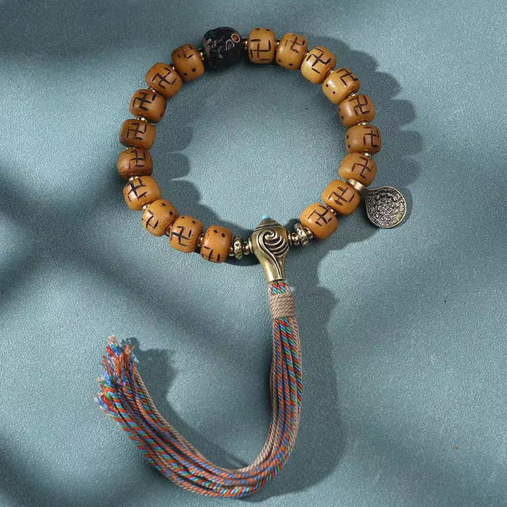 BWOOOH Natural Tibetan Camel Bone Swastika Dzi Bead Shankha Buddha Charm Kirtimukha Luck Protection Tassel Bracelet