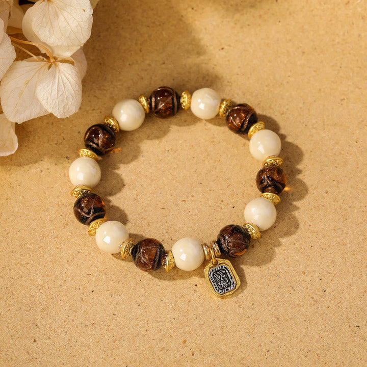 BWOOOH Tibetan Zakiram Goddess of Wealth Charm Liuli Glass Incense Ash Porcelain Bead Protection Bracelet