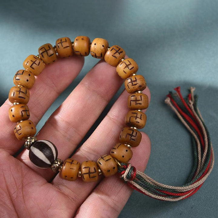 BWOOOH Natural Tibetan Camel Bone Swastika Dzi Bead Shankha Buddha Charm Kirtimukha Luck Protection Tassel Bracelet