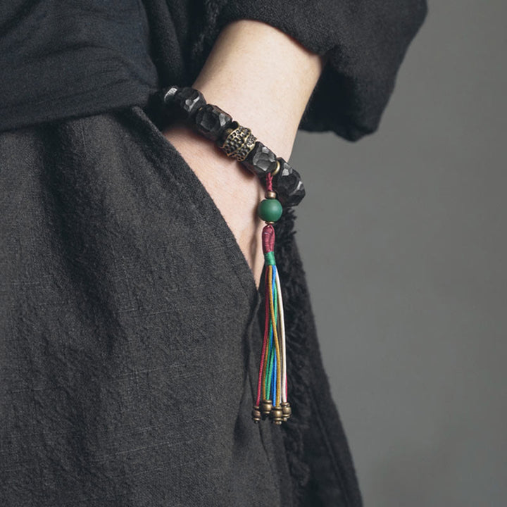 BWOOOH Tibet Ebony Wood Copper Peace Tassel Wrist Mala Bracelet