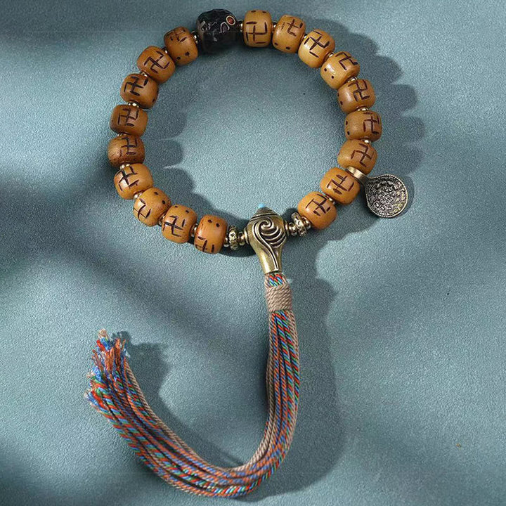 BWOOOH Natural Tibetan Camel Bone Swastika Dzi Bead Shankha Buddha Charm Kirtimukha Luck Protection Tassel Bracelet