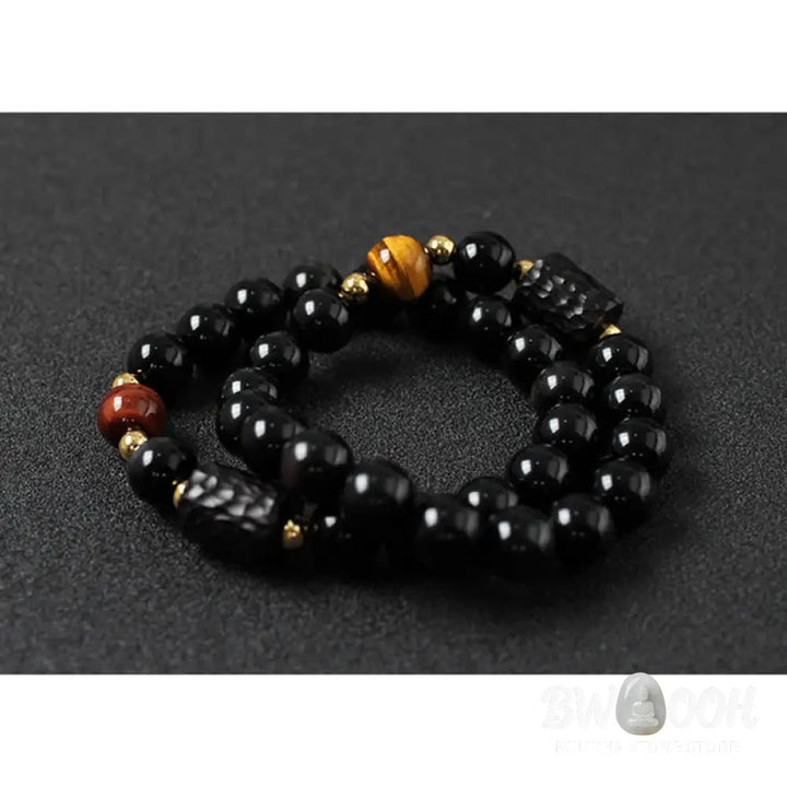 BWOOOH Black Obsidian Ebony Wood and Red Tiger Eye Strength Couple Bracelet designed by Drolma