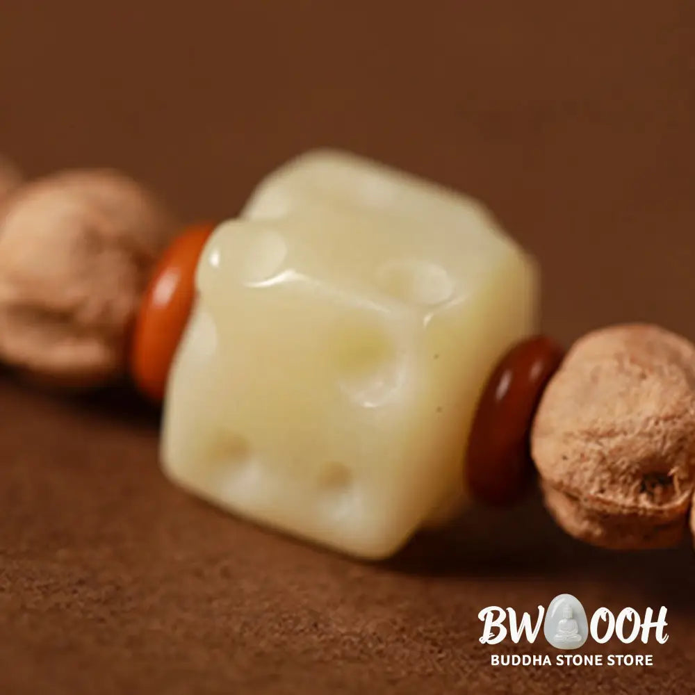 BWOOOH 108-bead Wisdom Mala bracelet featuring natural dark Bodhi Seeds, vibrant red agate beads, and a detailed deer head charm, displayed on a serene background, perfect for meditation and spiritual balance. - View 12