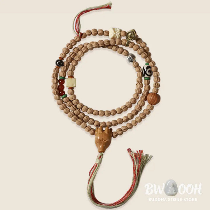 BWOOOH 108-bead Wisdom Mala bracelet featuring natural dark Bodhi Seeds, vibrant red agate beads, and a detailed deer head charm, displayed on a serene background, perfect for meditation and spiritual balance. - View 14