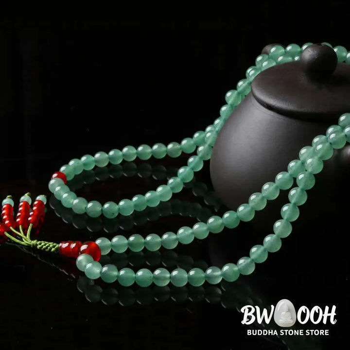 BWOOOH handcrafted 108-bead mala bracelet, showcasing polished 6mm green aventurine and red agate with a fine tassel, enhancing meditation &amp; luck. - View 8