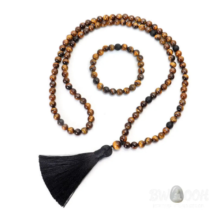 A BWOOOH 108-bead Tiger Eye protection mala bracelet with a matching tassel, showcased on a wrist for meditation and daily spiritual practice, emphasizing courage and positive energy. - View 11