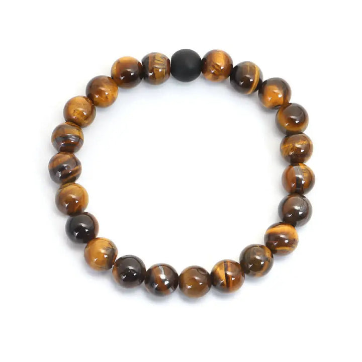 A BWOOOH 108-bead Tiger Eye protection mala bracelet with a matching tassel, showcased on a wrist for meditation and daily spiritual practice, emphasizing courage and positive energy. - View 4