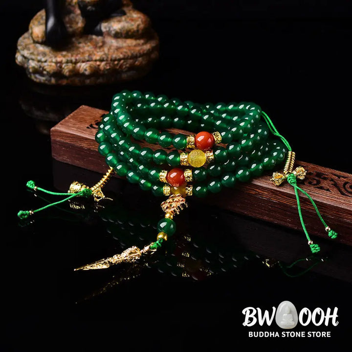 BWOOOH Natural Green Agate 108-bead Success Mala, depicted as a coiled bracelet, showcasing polished green agate stones for meditation, courage, and manifesting victory. - View 2