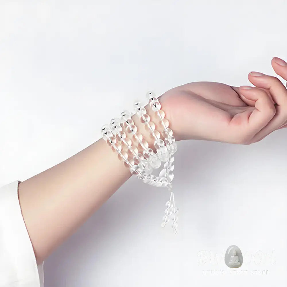 Close-up of BWOOOH 108 Clear Quartz Protection Mala, featuring polished 6mm or 8mm white crystal beads on elastic string, suitable for meditation and wrist wear. - View 8