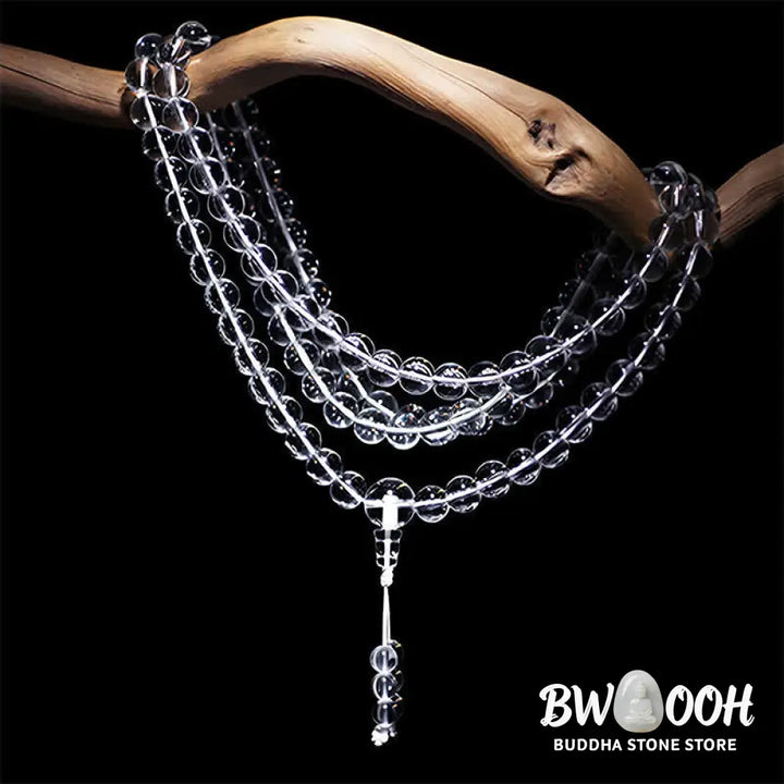 Close-up of BWOOOH 108 Clear Quartz Protection Mala, featuring polished 6mm or 8mm white crystal beads on elastic string, suitable for meditation and wrist wear. - View 7