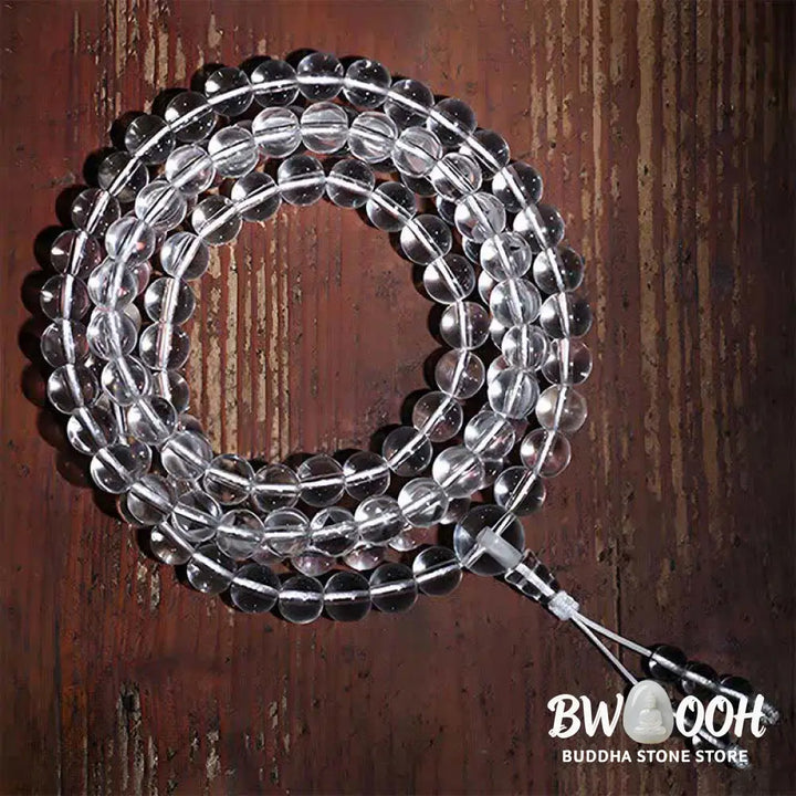Close-up of BWOOOH 108 Clear Quartz Protection Mala, featuring polished 6mm or 8mm white crystal beads on elastic string, suitable for meditation and wrist wear. - View 3