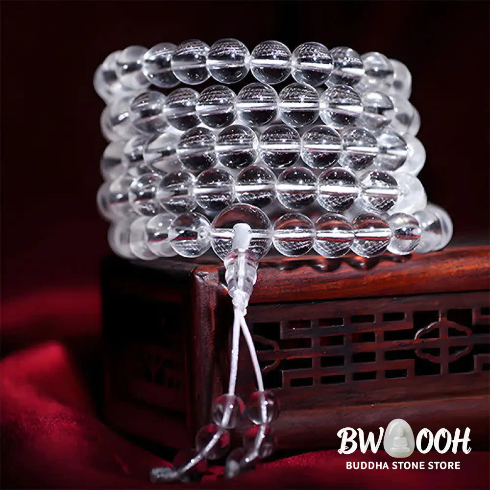 Close-up of BWOOOH 108 Clear Quartz Protection Mala, featuring polished 6mm or 8mm white crystal beads on elastic string, suitable for meditation and wrist wear. - View 2