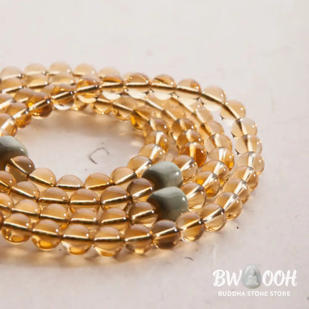 BWOOOH 108 Mala Protection Prosperity Bracelet featuring 6.5-7mm natural Citrine, Sandalwood, and Turquoise beads with 925 Sterling Silver accents on a premium elastic string, suitable for 15-16cm wrists. Ideal for mindfulness and spiritual balance. - View 20