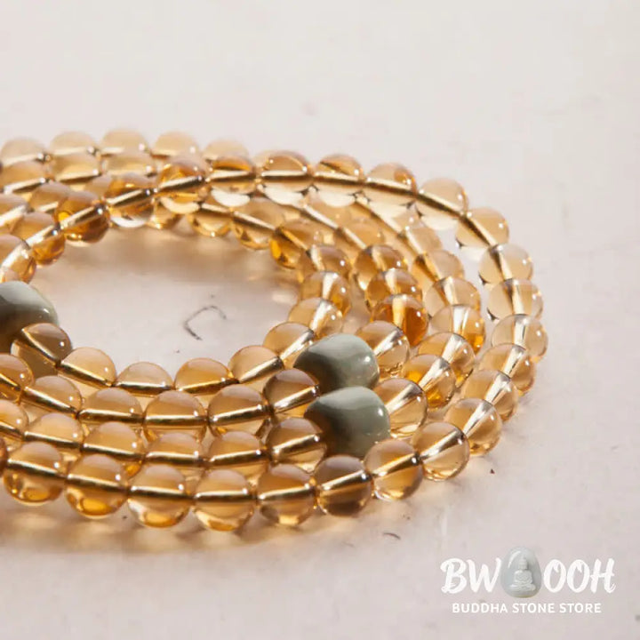 BWOOOH 108 Mala Protection Prosperity Bracelet featuring 6.5-7mm natural Citrine, Sandalwood, and Turquoise beads with 925 Sterling Silver accents on a premium elastic string, suitable for 15-16cm wrists. Ideal for mindfulness and spiritual balance. - View 20