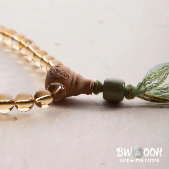 BWOOOH 108 Mala Protection Prosperity Bracelet featuring 6.5-7mm natural Citrine, Sandalwood, and Turquoise beads with 925 Sterling Silver accents on a premium elastic string, suitable for 15-16cm wrists. Ideal for mindfulness and spiritual balance. - View 22
