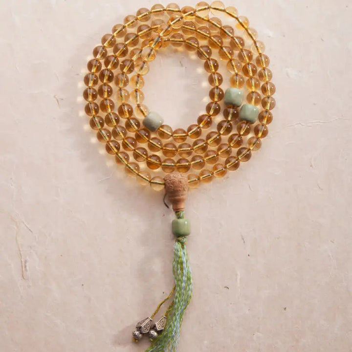 BWOOOH 108 Mala Protection Prosperity Bracelet featuring 6.5-7mm natural Citrine, Sandalwood, and Turquoise beads with 925 Sterling Silver accents on a premium elastic string, suitable for 15-16cm wrists. Ideal for mindfulness and spiritual balance.